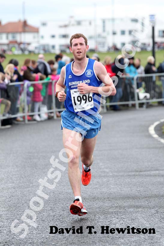 Kevin Calvert (Sunderland Harriers) finishing 3rd in the North Tyneside 10k Road Race from North Shields to Whitley Bay.